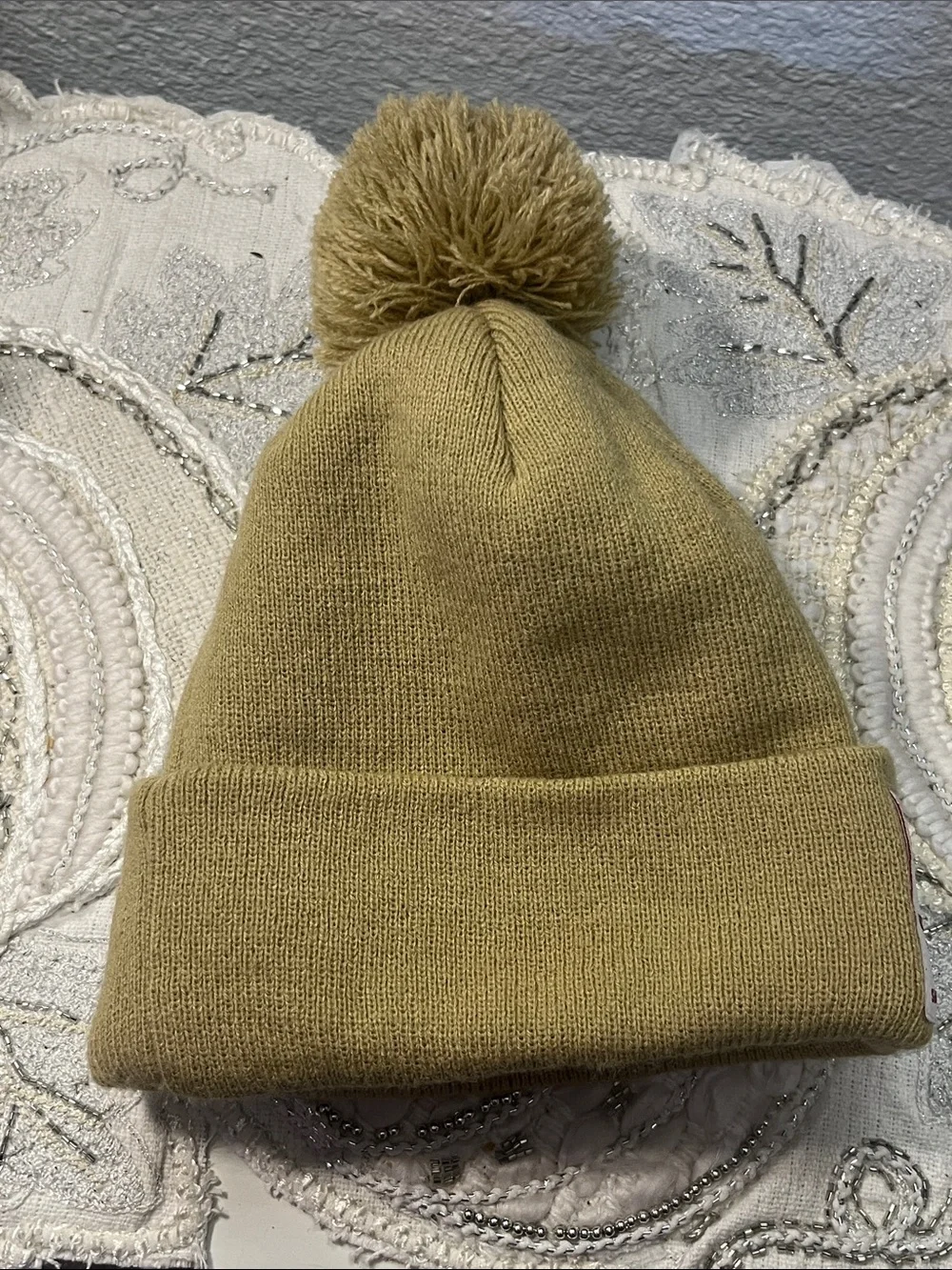 NWOT True Religion Tan Pom Pom Knit Beanie Hat Buddha Patch